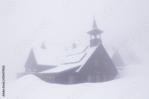 Little hut covered in fog