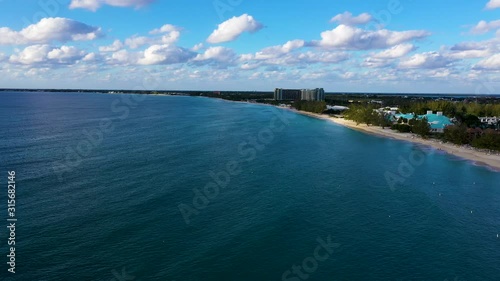 Wallpaper Mural aerial drone footage of seven mile beach on the island of grand cayman in the cayman islands in the tropical waters of the caribbean sea during winter Torontodigital.ca