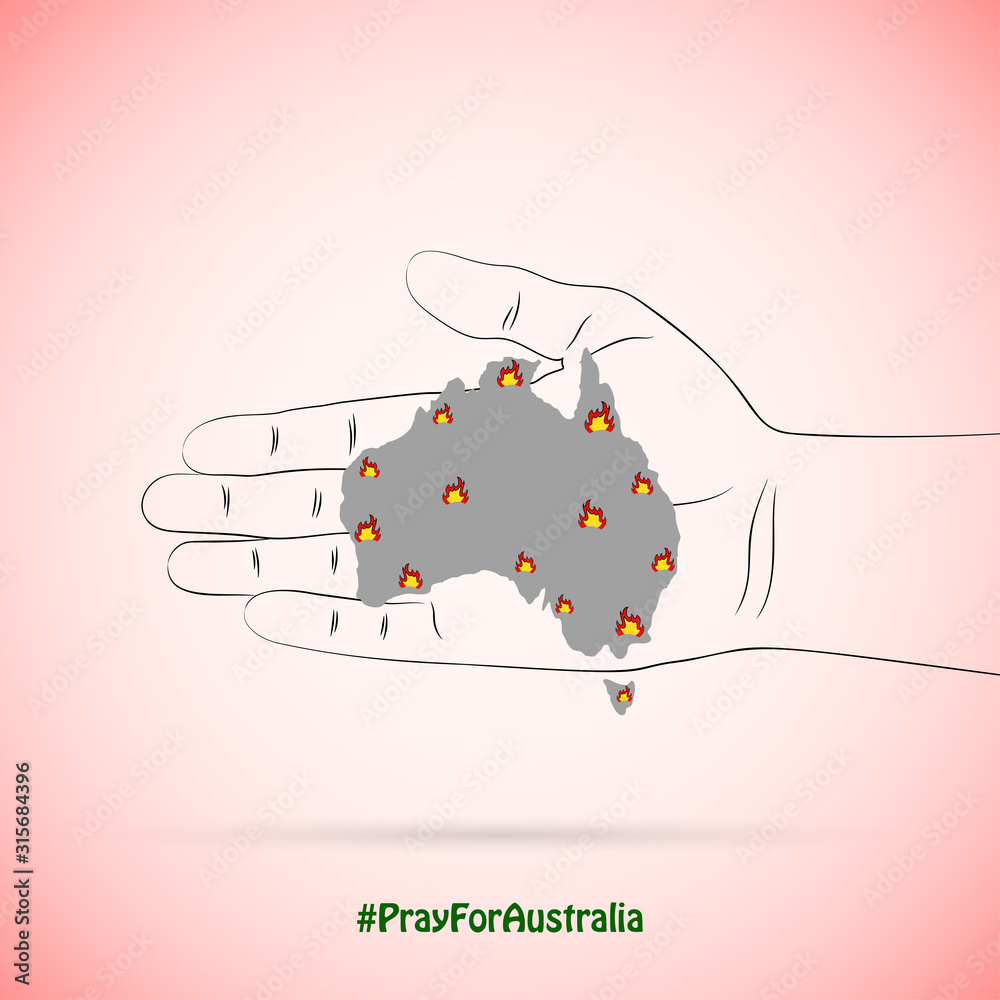 Naklejka premium Hand hold a map of Australia in wildfires .