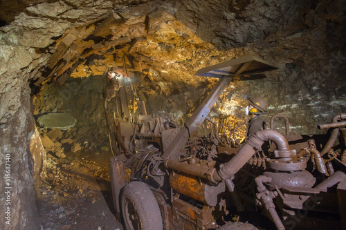 Underground gold bauxite mine shaft tunnel with drilling machine