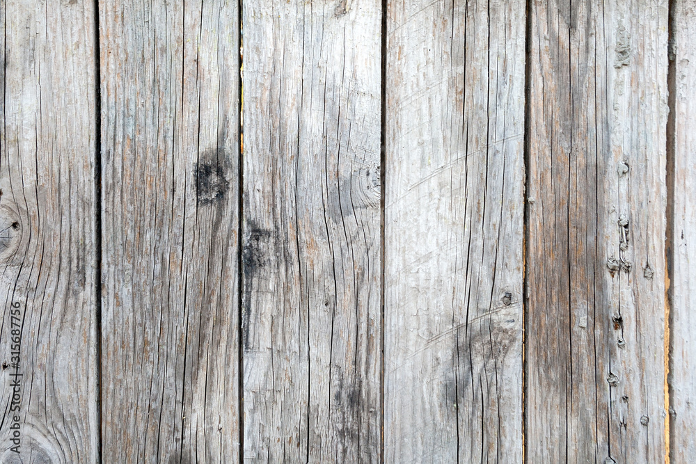Old wooden background with vertical weathered boards and rusty nails Old wooden background with vertical weathered boards and rusty nails