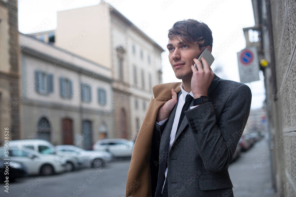 Portrait of young businessman on the phone Portrait of young businessman on the phone
