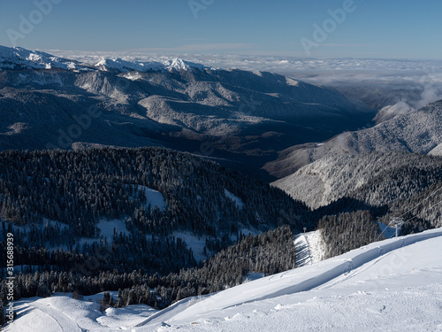 Mountain peaks of the Caucasus at Krasnaya Polyana, the village Rosa Khutor, winter sports resort of Sochi, Krasnodar Krai, Russia