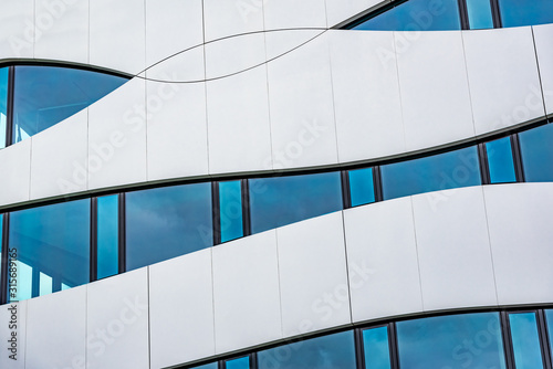Windows of a modern building as a background.