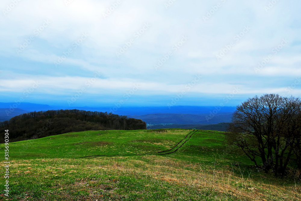 landscape with blue sky and clouds