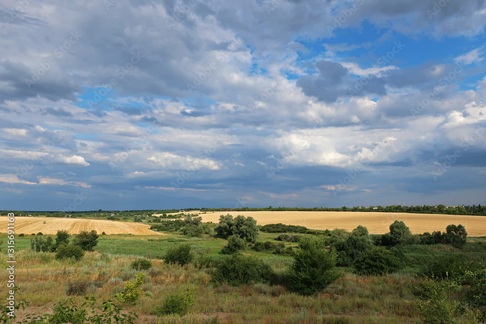 landscape with blue sky and clouds