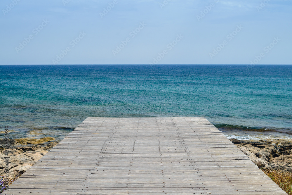 empty wooden pier with sea view