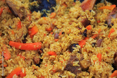 Traditional pilaf with lamb preparated on the fire.