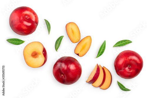 Fototapeta Naklejka Na Ścianę i Meble -  fresh red plum and half with leaves isolated on white background with copy space for your text. Top view. Flat lay