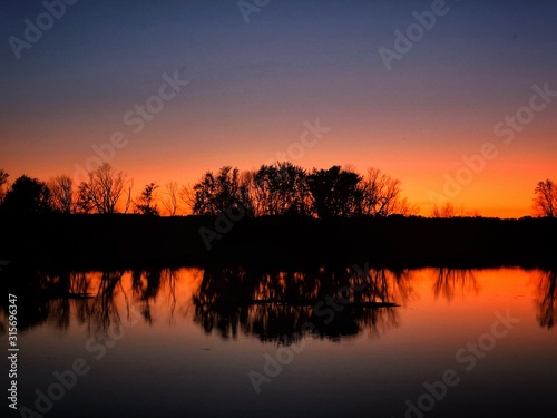 Reflection sunset over lake