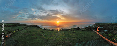 Aerial panorama from the west coast of Bali in Indonesia at sunset