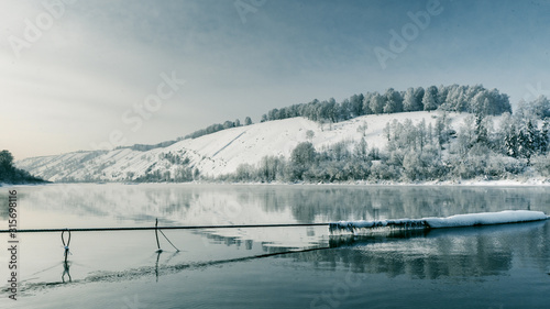 winter river near the mountain © KOROLEV