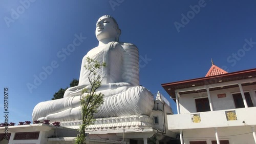 Kandy, Sri Lanka, November 20, 2019, Bahiravokanda Vihara Buddha Statue room with stone gilded Buddha 4K photo