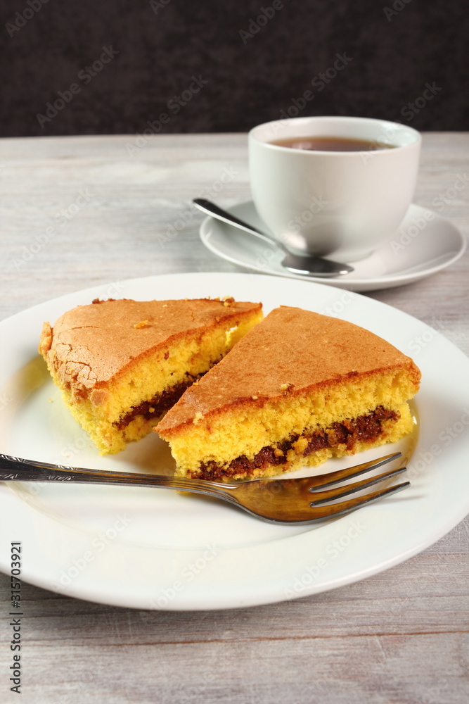 Sponge cake stuffed with chocolate filling Sponge cake stuffed with chocolate filling