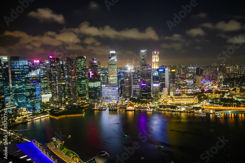 Aerial View of the Singapore Skyline at night © Torval Mork