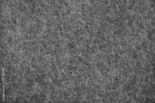 Texture of gray material. Graphite fabric background.