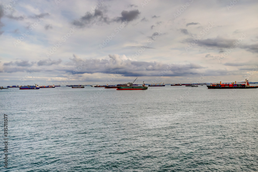 Marine vessels anchored in the Singapore harbour Marine vessels anchored in the Singapore harbour
