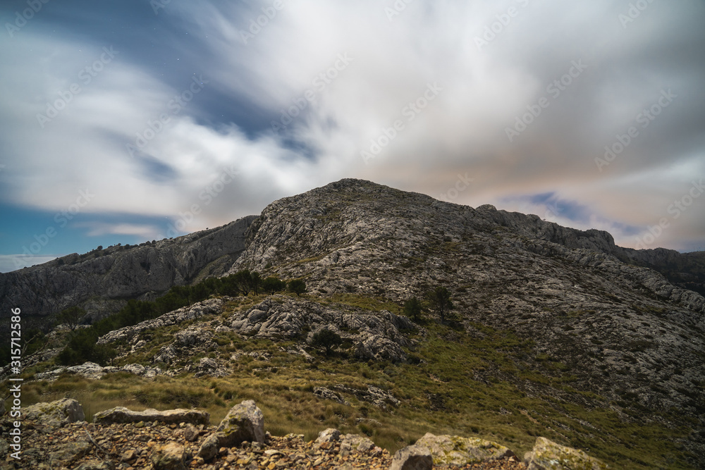 Rocky peak with flat mountain vegetation