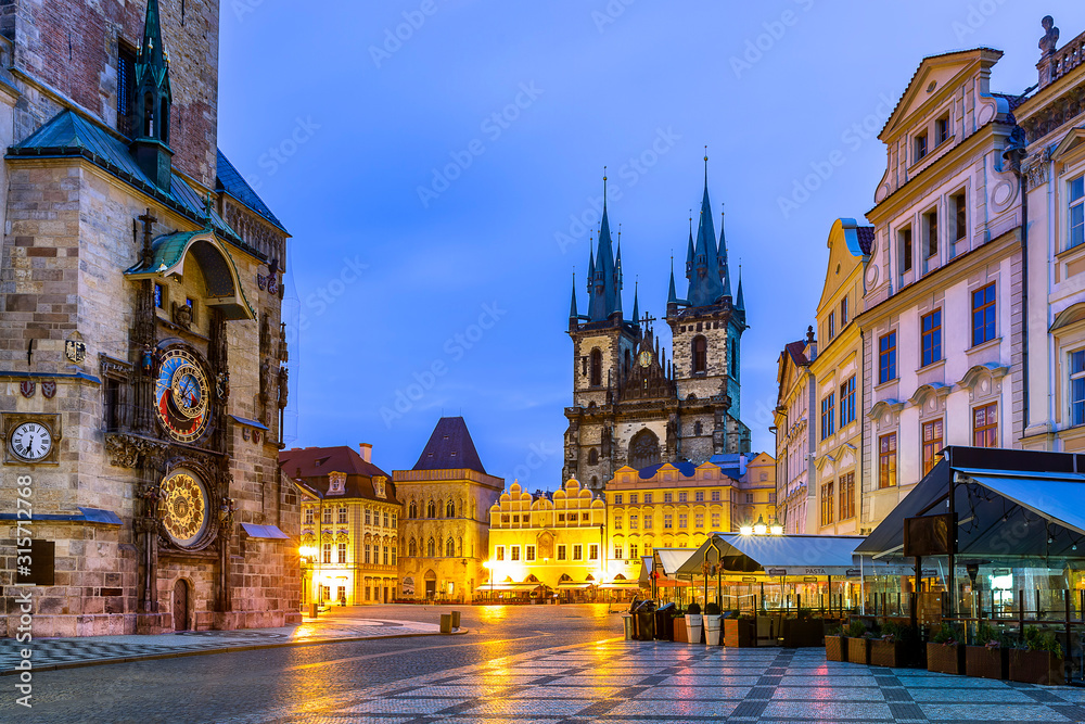 Czech Republic, Prague, Astronomical clock of Old Town Hall and Church of Our Lady before Tyn at dusk Czech Republic, Prague, Astronomical clock of Old Town Hall and Church of Our Lady before Tyn at dusk