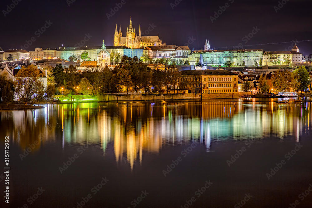 Czech Republic, Prague, Vltava river, Prague Castle and surrounding buildings at night Czech Republic, Prague, Vltava river, Prague Castle and surrounding buildings at night