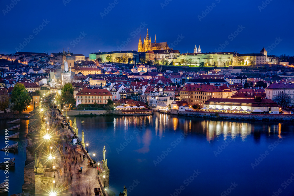 Czech Republic, Prague, Vltava River, Charles Bridge, Prague Castle and surrounding buildings at night Czech Republic, Prague, Vltava River, Charles Bridge, Prague Castle and surrounding buildings at night