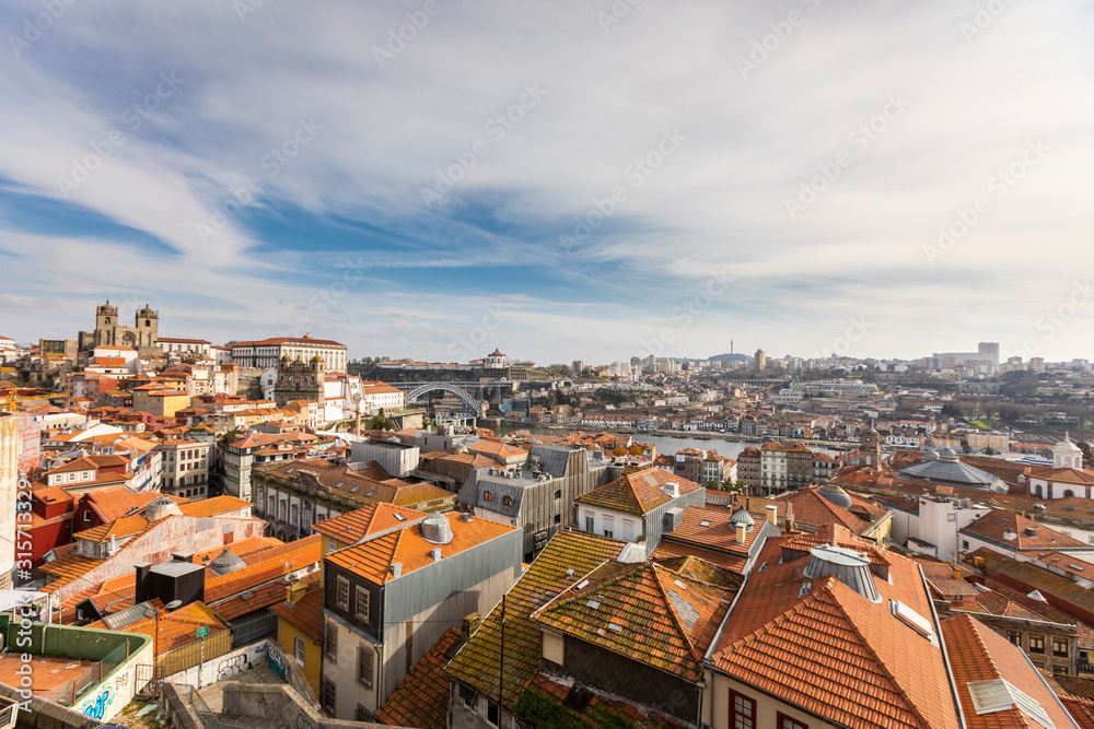 Portugal, Porto District, Porto, Clouds over roofs of city buildings seen from Miradouro da Vitoria Portugal, Porto District, Porto, Clouds over roofs of city buildings seen from Miradouro da Vitoria