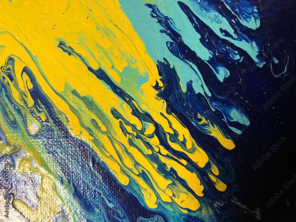 Beautiful abstract acrylic fluid blue and yellow background.
