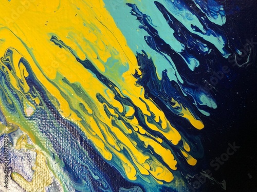 Beautiful abstract acrylic fluid blue and yellow background.