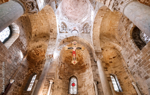 Ceiling and arches with crucifix inside the 12th century San Cataldo church in Palermo. UNESCO World Heritage Site, as an Arab-Norman church photo