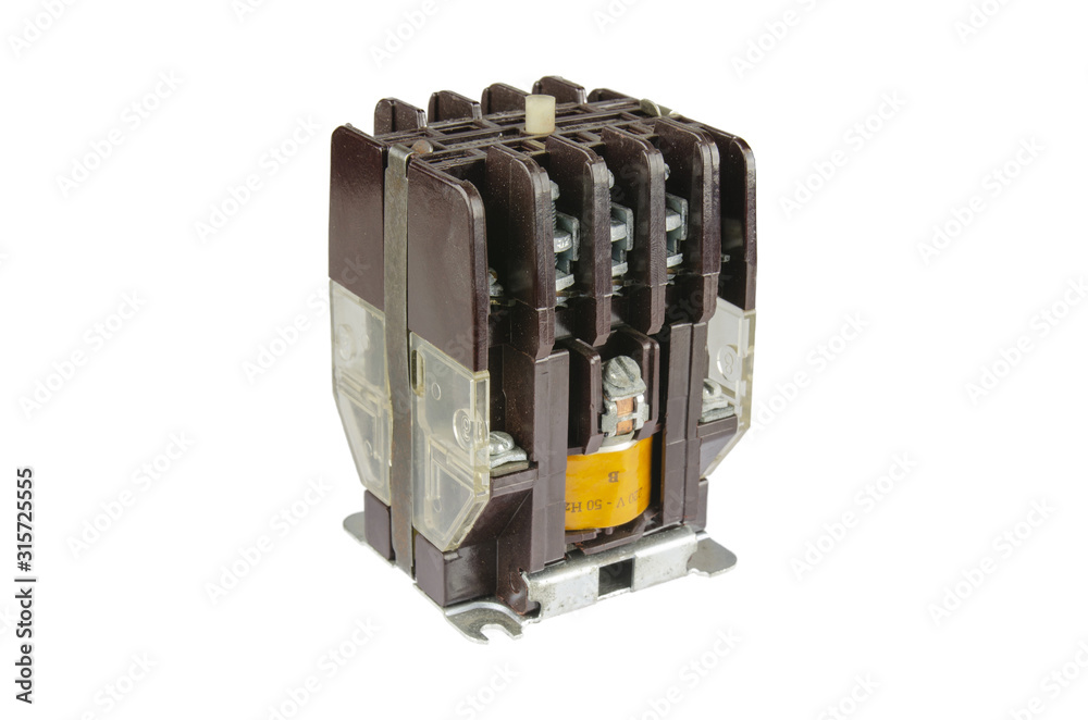 Old, retro, Three-phase circuit breaker lying on the table. Old, retro, Three-phase circuit breaker lying on the table.
