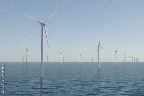 Wind turbines on the ocean. Offshore wind farm.