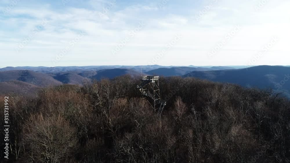 Wide aerial watch tower in open Monongahela National Forest landscape Wide aerial watch tower in open Monongahela National Forest landscape