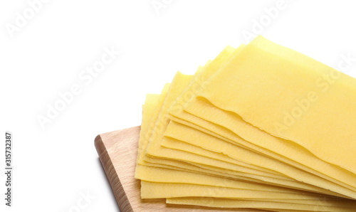 Uncooked Italian pasta lasagne isolated on white background