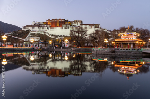 Stunning twilight over the famous Potala Palace in Lhasa old town in Tibet, China