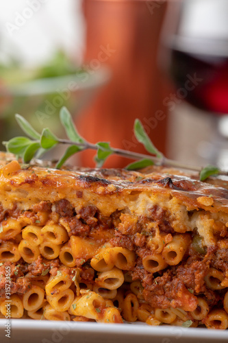 greek pastizio noodle dish with cheese photo