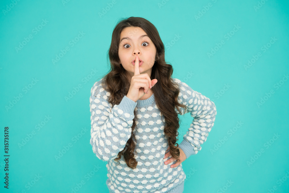 Keep secret. Little girl keep index finger by her lips. Be silent. Rumor legend and myth. Confidential information and secret. Secret story concept. Child surprised face just told her secret Keep secret. Little girl keep index finger by her lips. Be silent. Rumor legend and myth. Confidential information and secret. Secret story concept. Child surprised face just told her secret