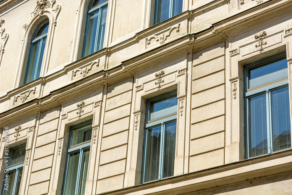 Many windows decorating a Secession style building. Many windows decorating a Secession style building.