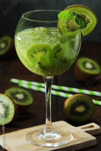A glass with kiwi cocktail 
