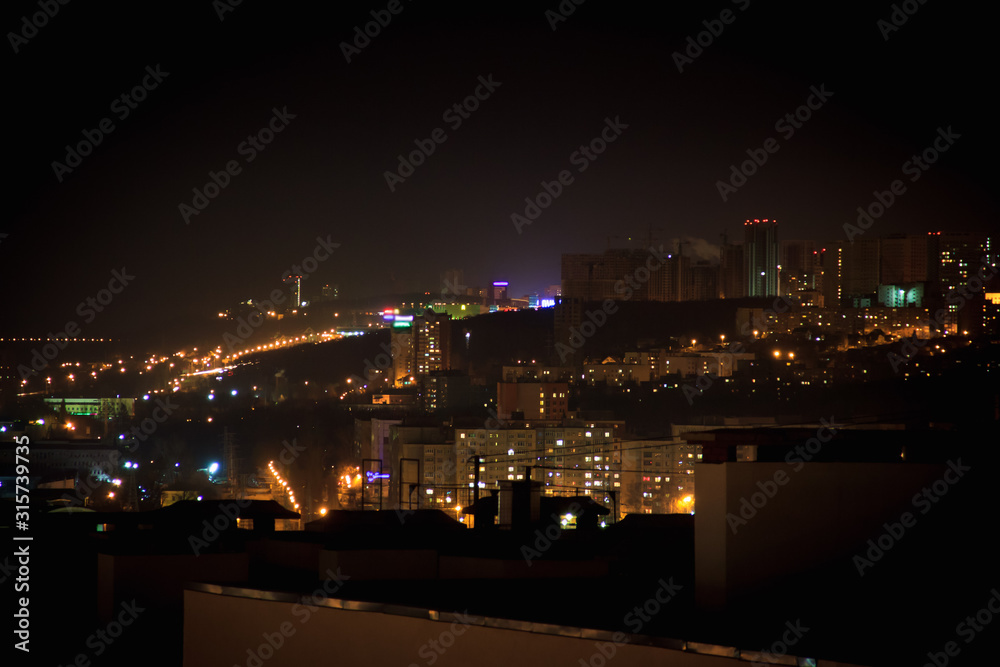 Night city skyline. Top aerial panoramic view of modern city fro
