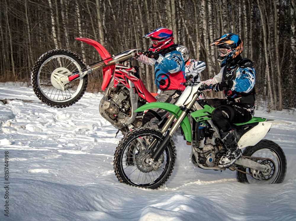 Sport. Winter motocross in the snow.