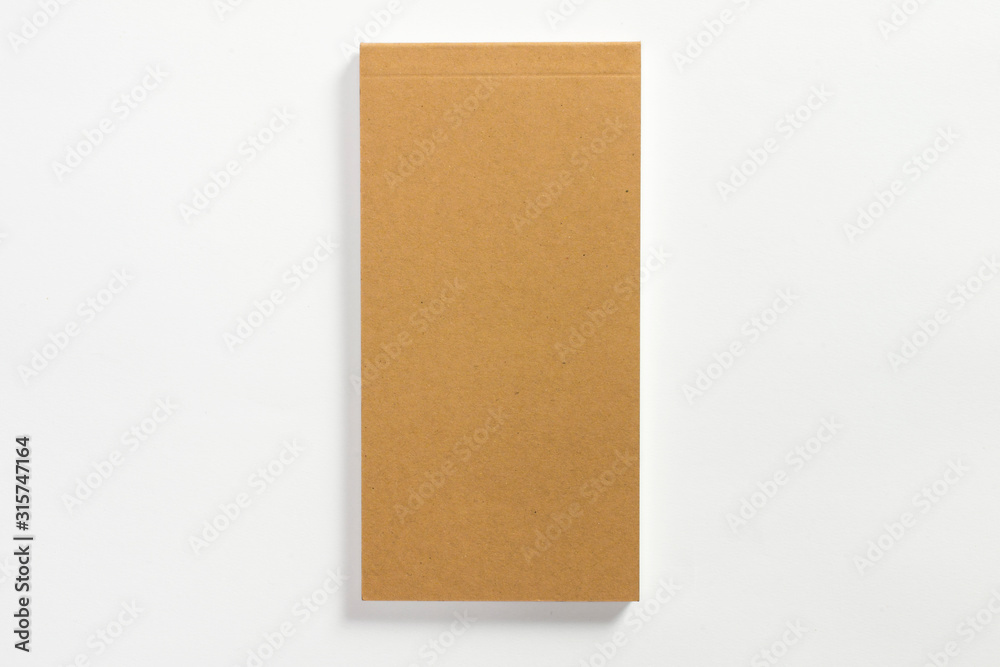 Blank closed pocket planner diary with cardboard cover isolated on white background Blank closed pocket planner diary with cardboard cover isolated on white background