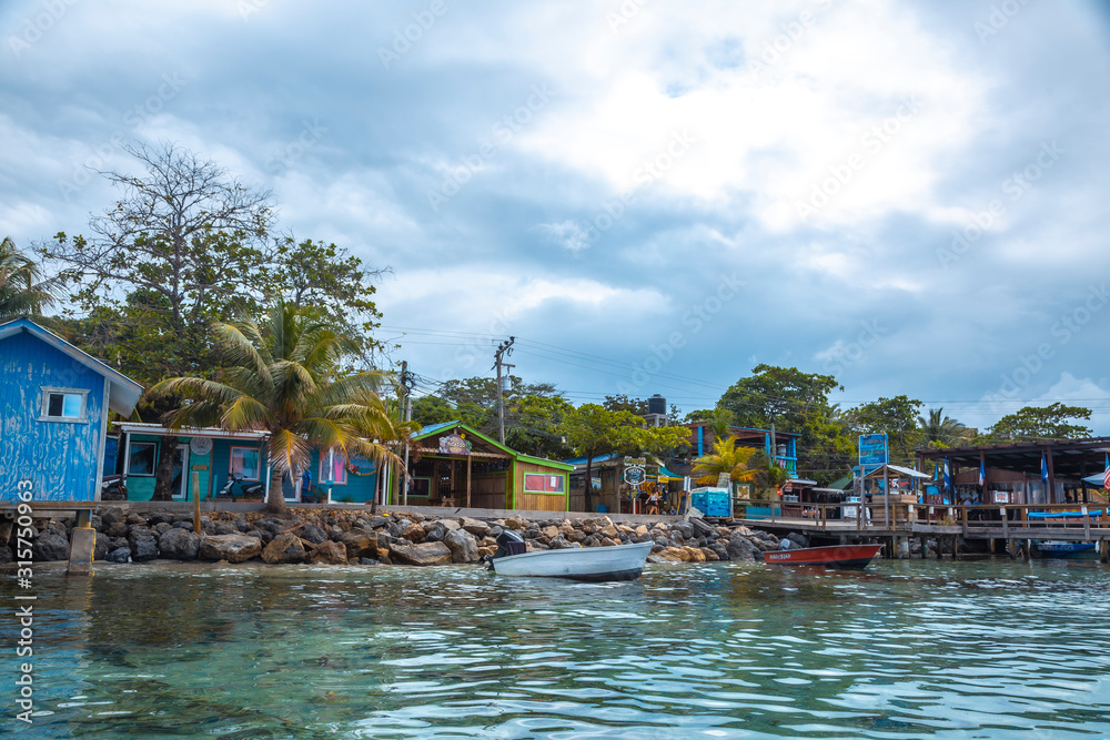 Roatán, Honduras »; January 2020: Small shops in West End on Roatán Island