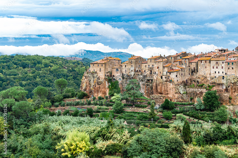 View of the medieval village Pitigliano founded in Etruscan time on the tuff hill, Tuscany, Italy