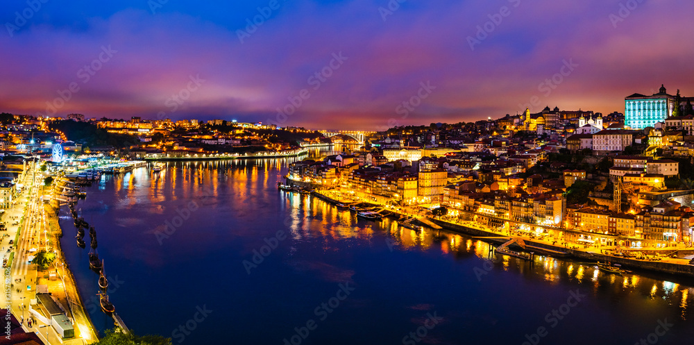 Porto city skyline, night cityscape panorama from Luis I bridge of Porto, Portugal