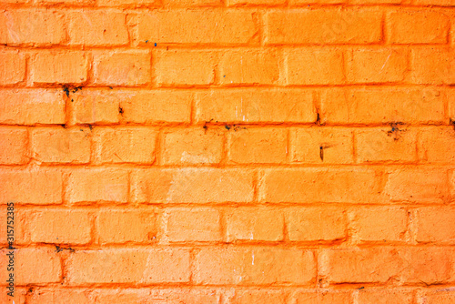 Weathered orange brick wall texture