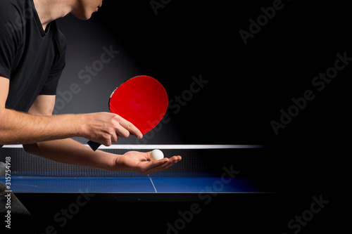 Portrait of young man playing tennis