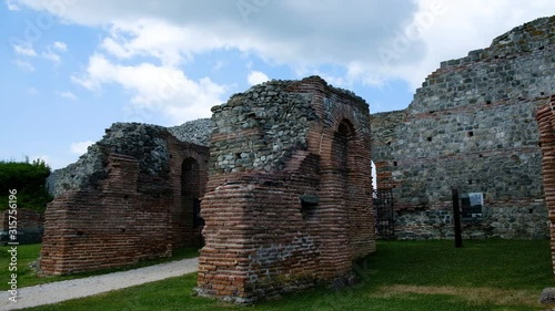 Time lapse of moving clouds over Gamzigrad (Felix Romuliana), UNESCO World Heritage Site in east Serbia, ancient Roman complex of palaces built in 3rd and 4th century AD by Roman Emperor Galerius photo