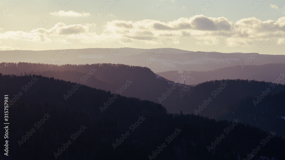 Mountains chain at magical sunset. colors variations on View of Carpathian Mountains at sunset Mountains chain at magical sunset. colors variations on View of Carpathian Mountains at sunset