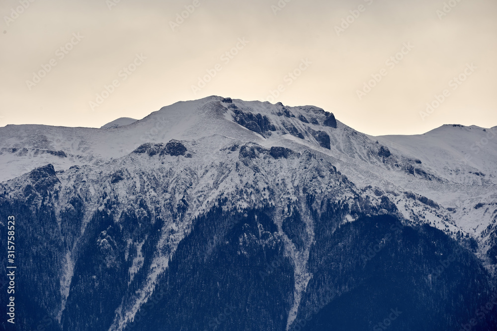 Mountain range capped with snow Mountain range capped with snow