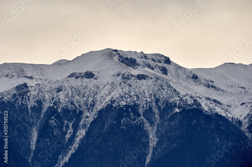 Mountain range capped with snow